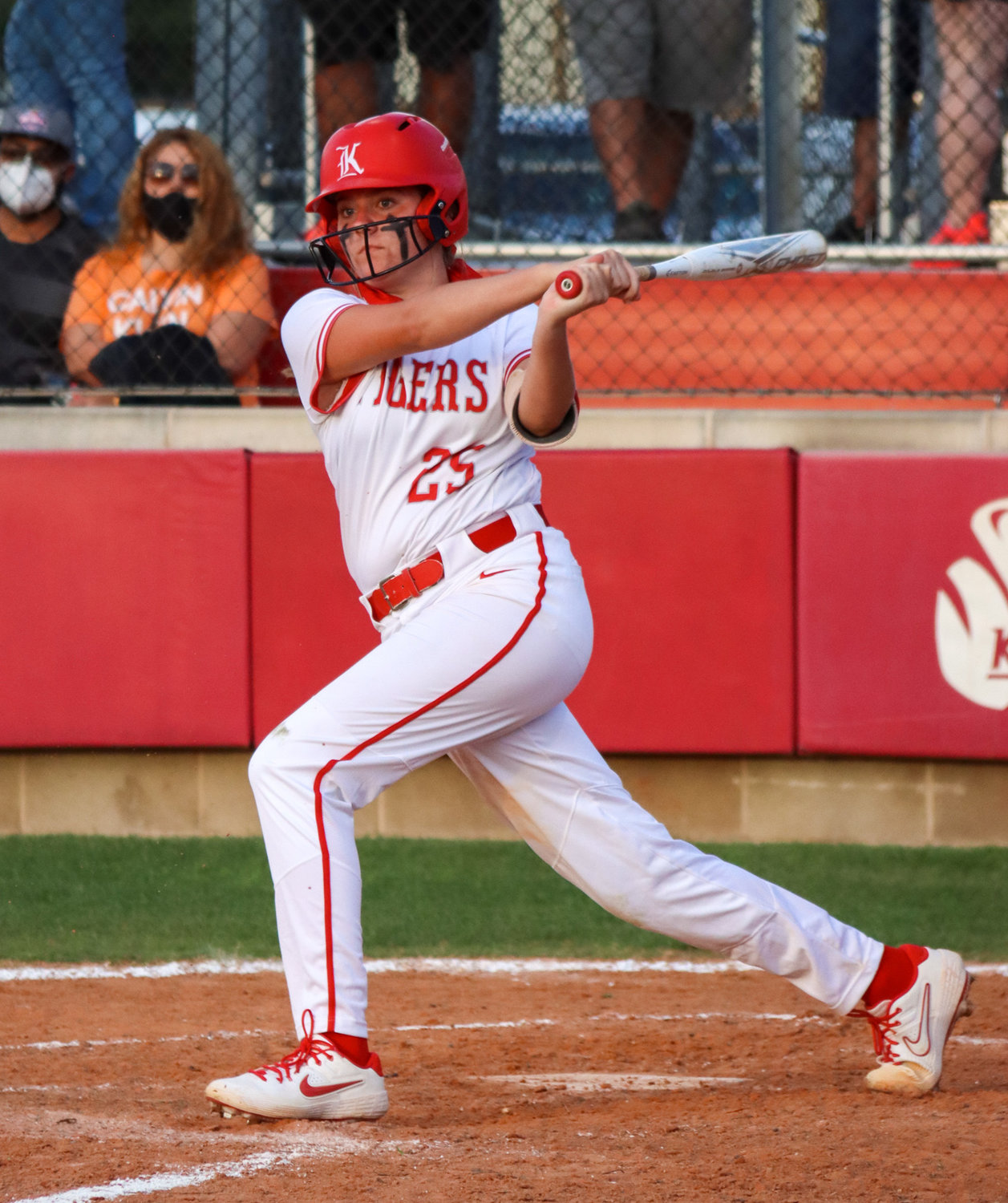 Katy High freshman Cameryn Harrison looks on after taking a swing during Game 1 of the team’s area playoff series against Houston Heights on Friday, May 7, at Katy High.
